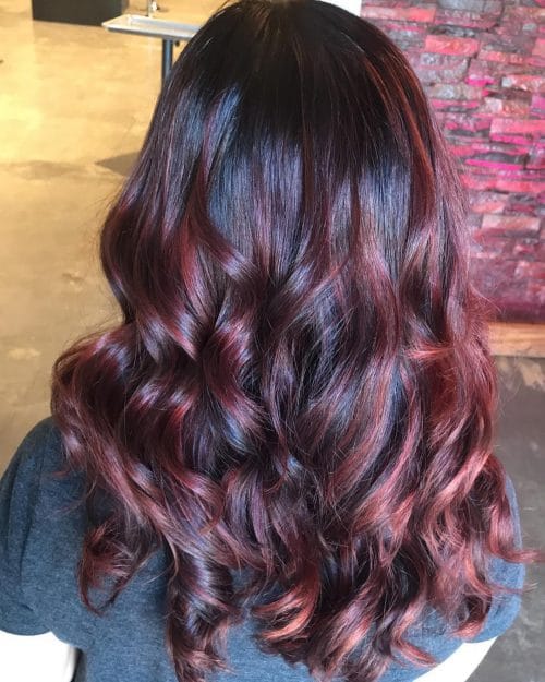 Chic Red Highlights on Brown Hair