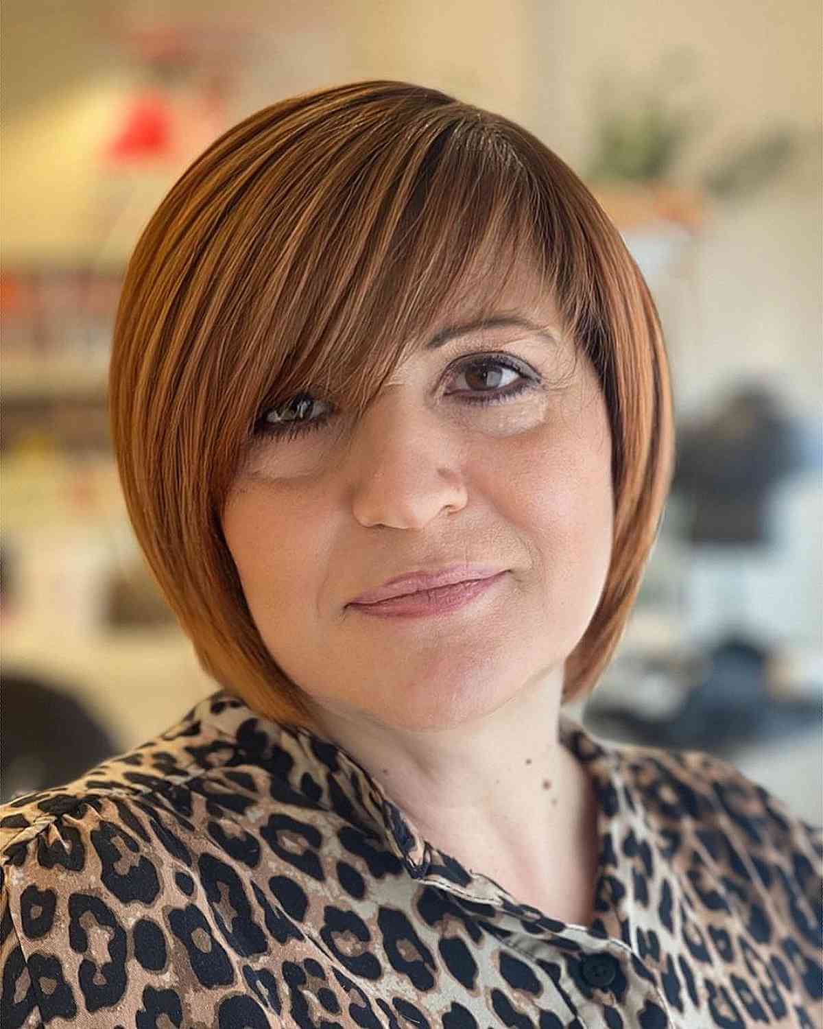 Chic Round Bob with Side-Swept Bangs for Women with Fine Hair