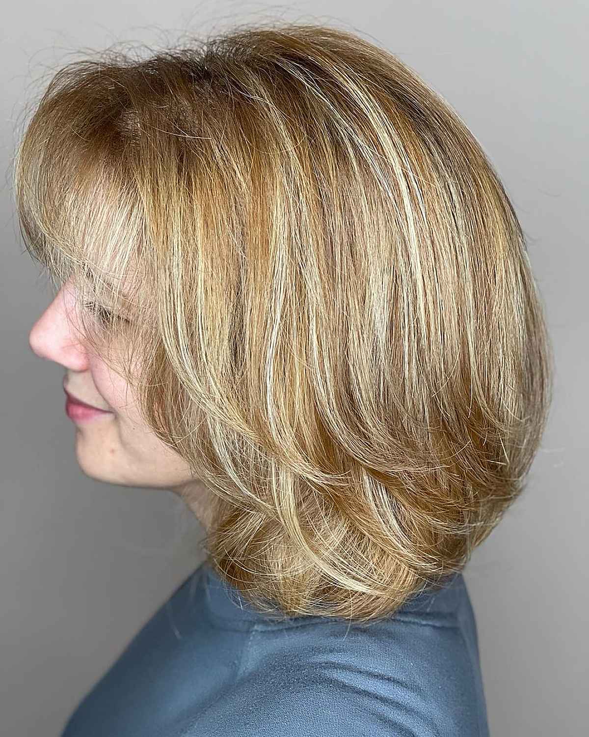Chic Round Lob Featuring Delicate Bangs and Gentle Layers