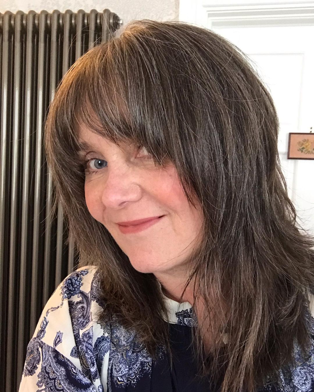 Shag hairstyle with bangs for mature women