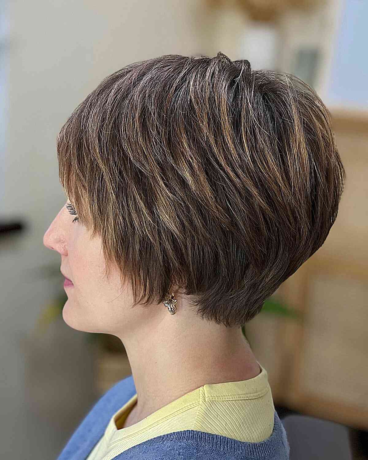 Chic Short Angled Cut with Soft Layers for Thick-Haired Ladies