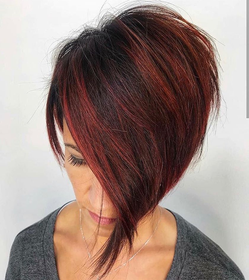 Chic Short Black Hair Accentuated with Red Highlights