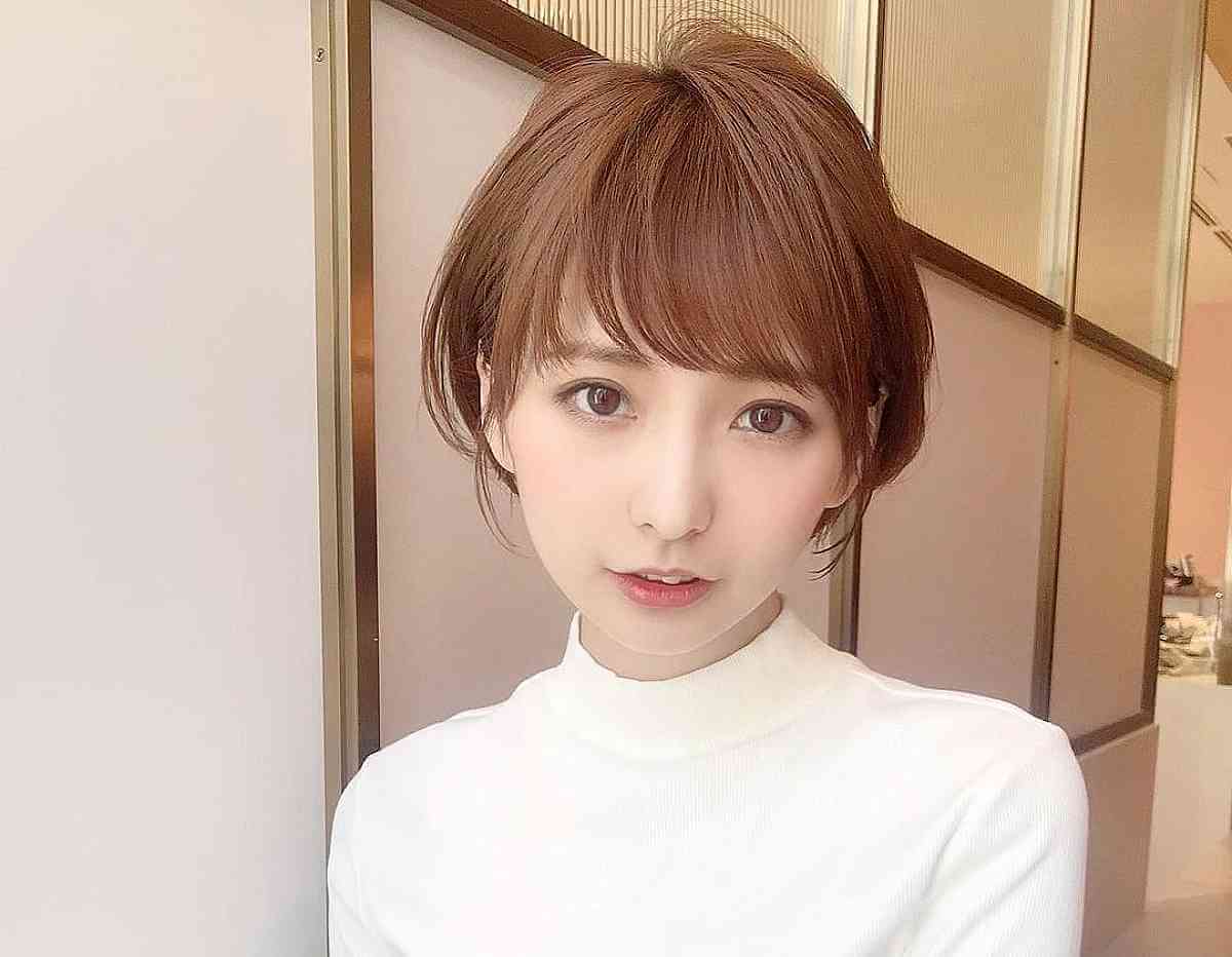 Chic Short Bob with Eyebrow-Length Bangs for Fine Hair