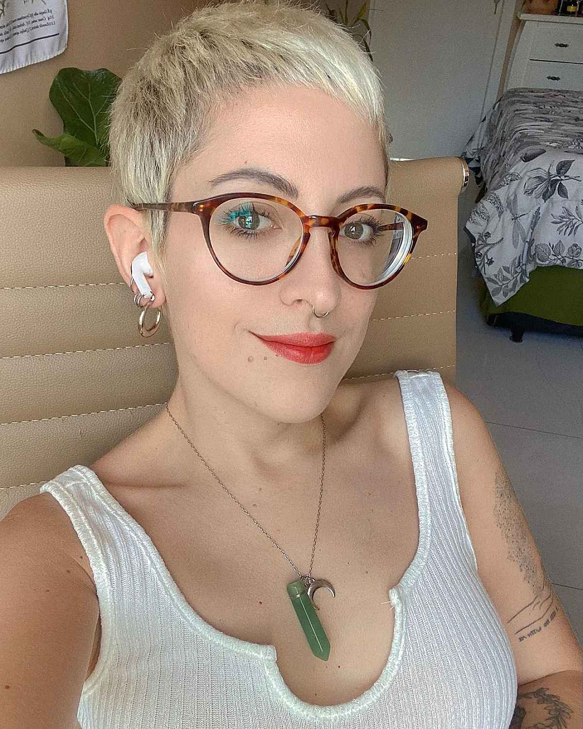 Chic Short Pixie Hairstyle for Women Who Wear Glasses