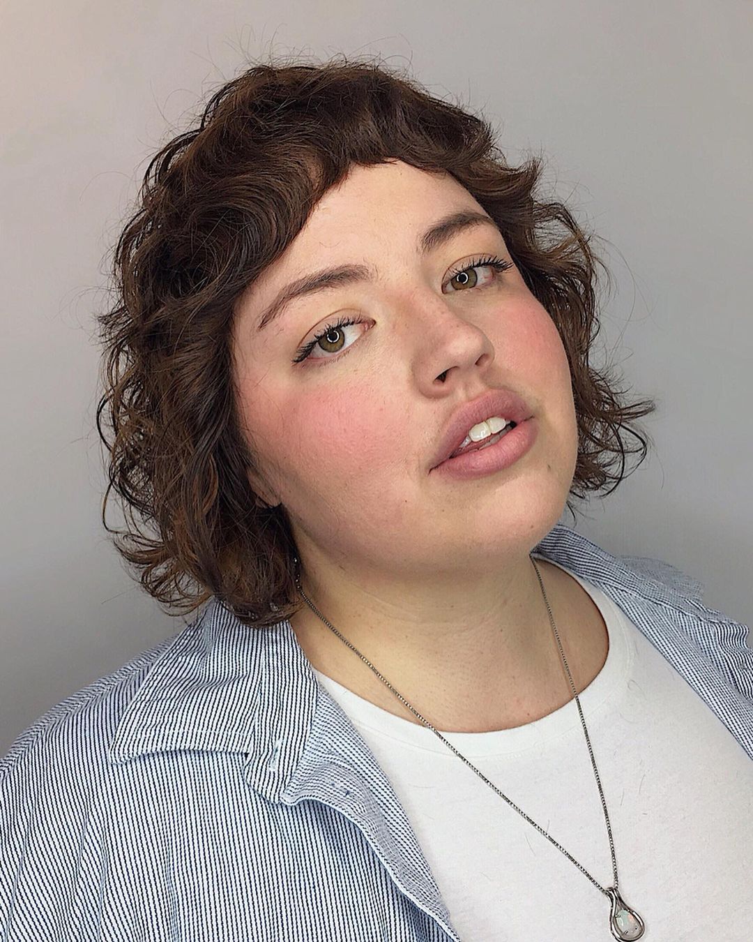 The chic Shaggy Bob Haircut on a girl with a rounded face shape