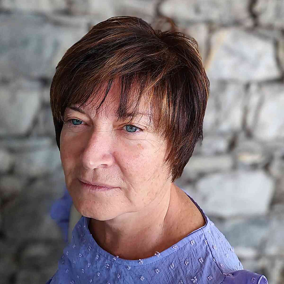 Effortless Chic Short Straight Hair with Delicate Bangs for Women Over 50
