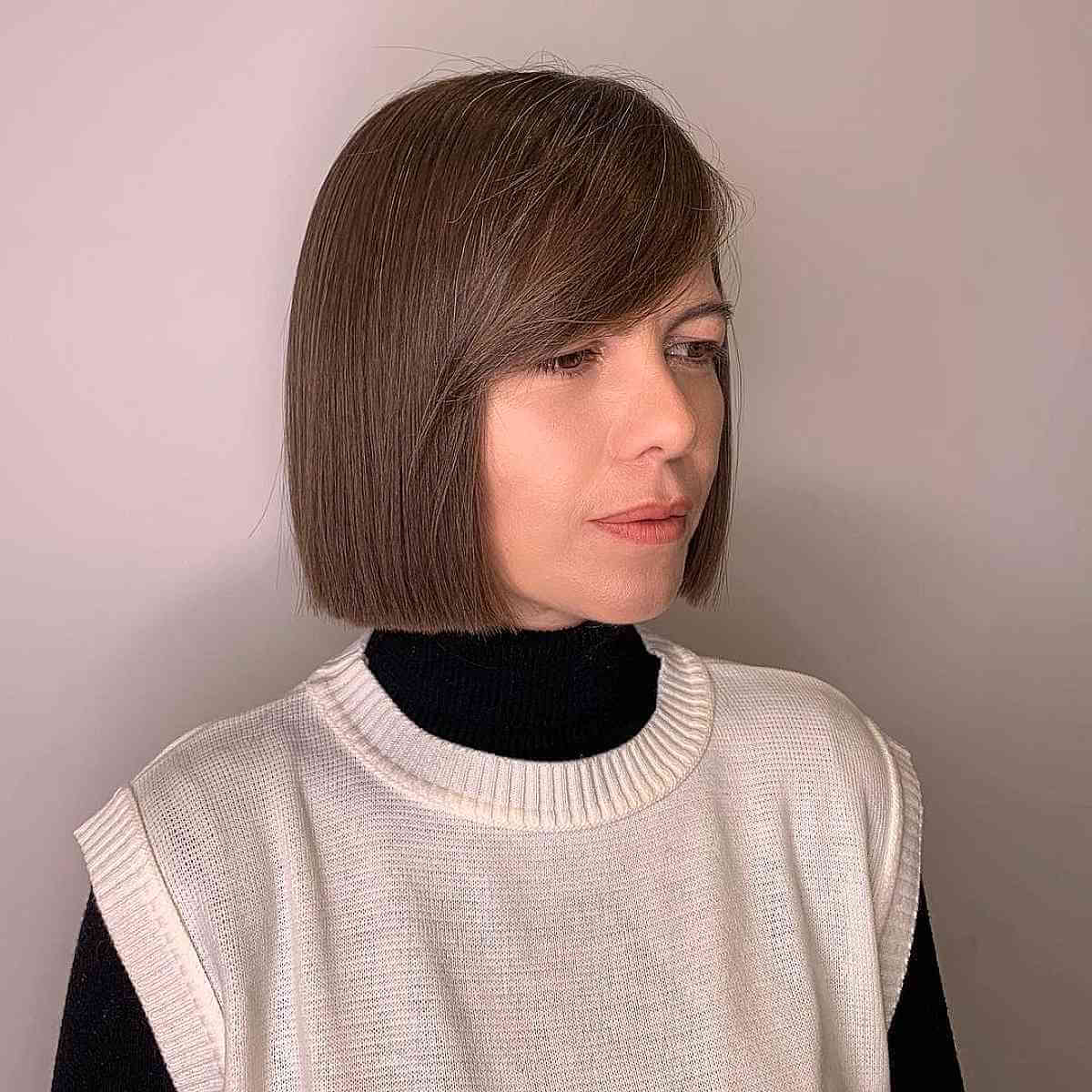 Chic Side Fringe on Short Symmetrical Chin-Length Hair