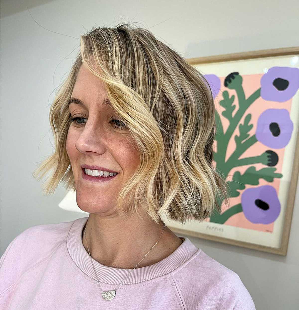Chin-Length Blonde Side-Swept Wavy Bob for Women Over 50