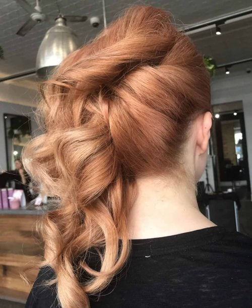 Chic Side Swept Updo Featuring Blonde Highlights