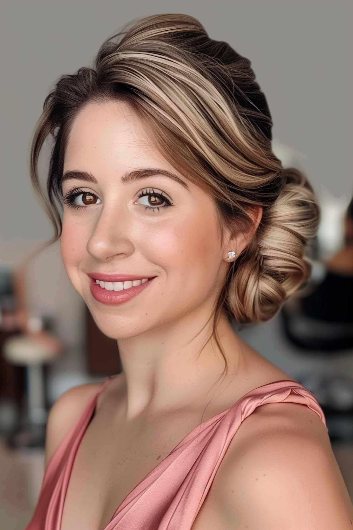 Woman showcasing a chic simple updo with gentle twists and soft face-framing tendrils