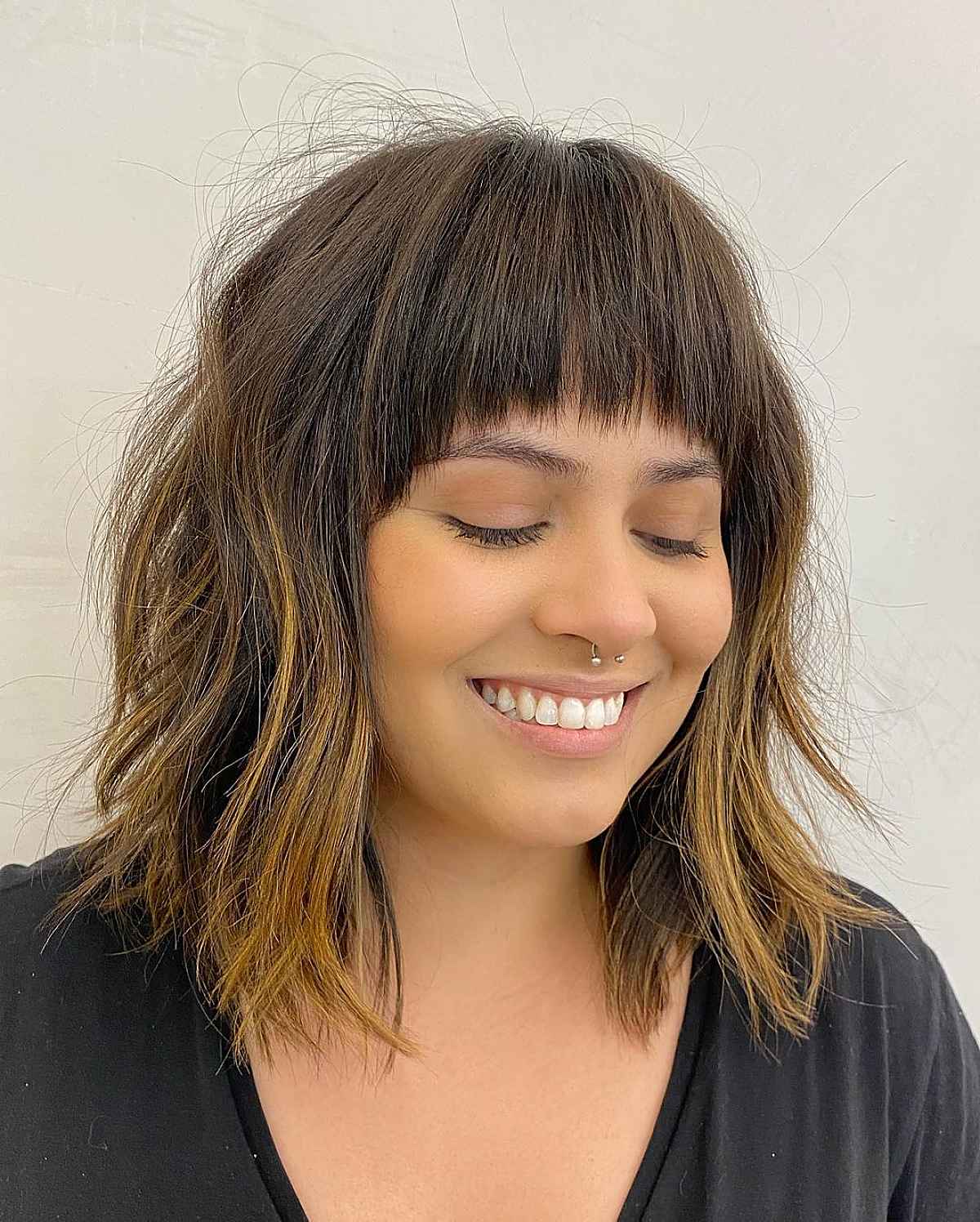 Chic Straight Bangs for a Textured Lob Cut