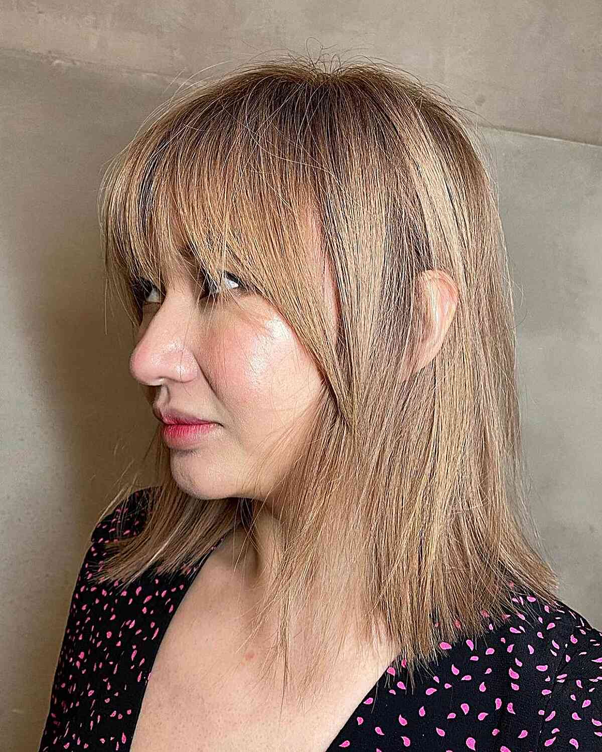 Chic Straight Bangs for Medium-Length Voluminous Hair