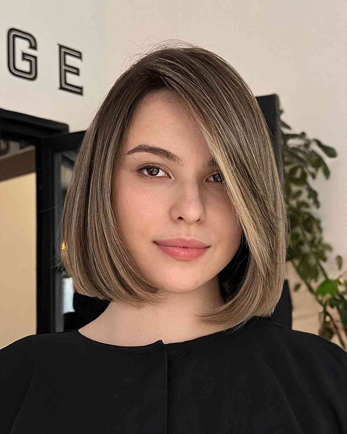 Stylish Neck-Length Bob with Side Part for Round Faces