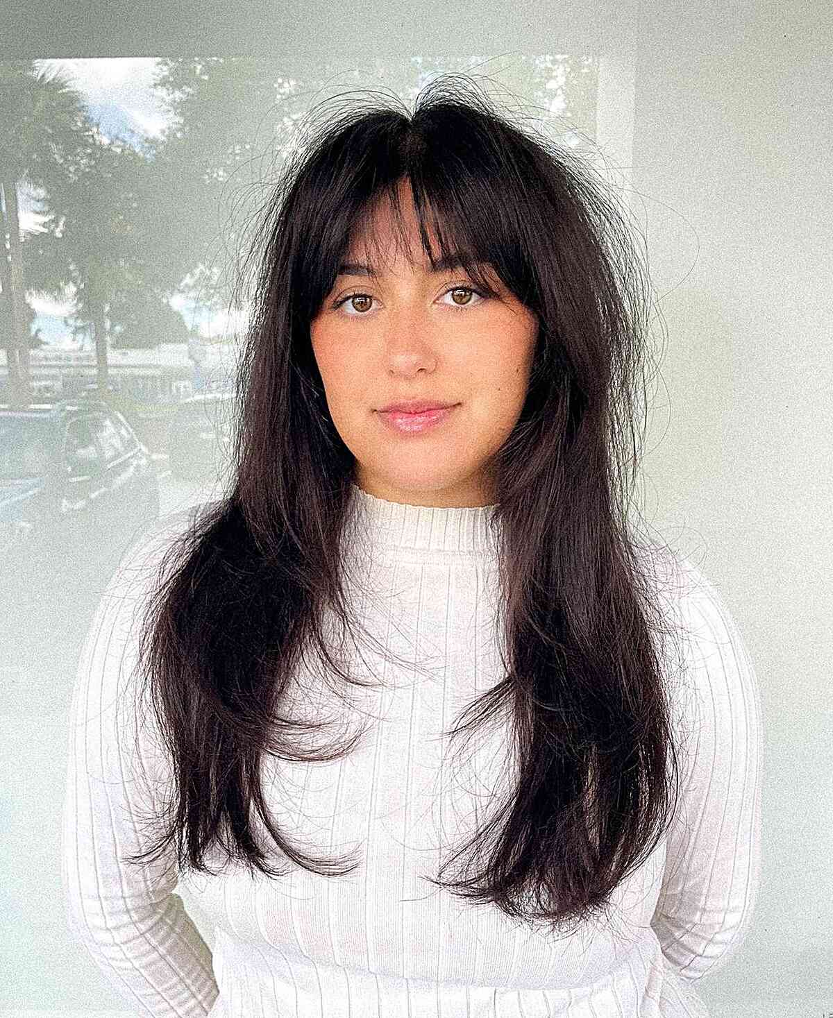 Long Chic Textured Hairstyle with a Soft Fringe