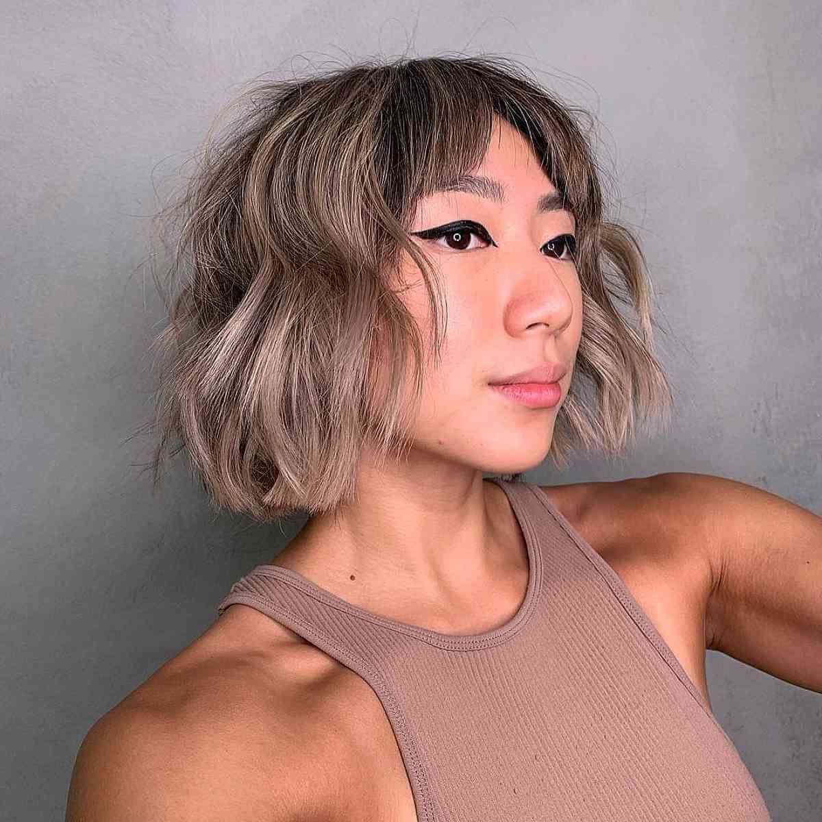 Chic Textured Hairstyle with Curtain Bangs