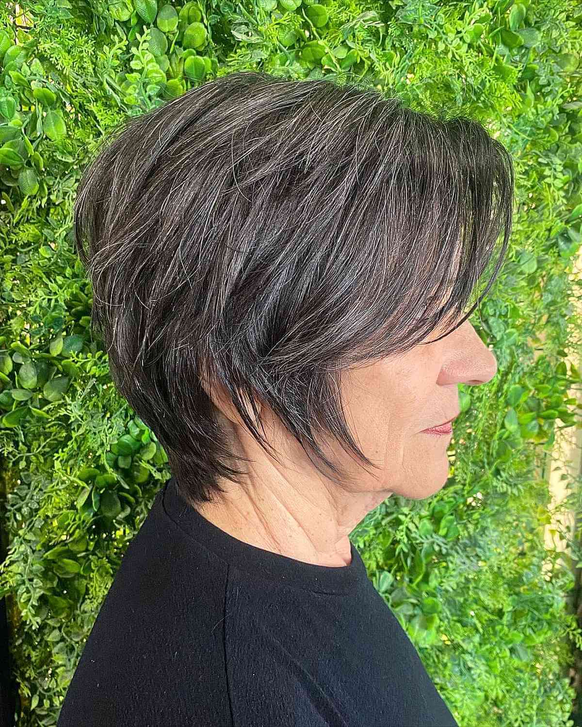 Chic Textured Long Pixie Haircut for a Woman Over 70