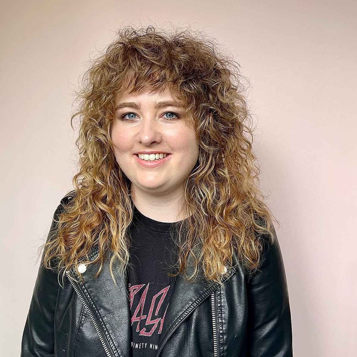 Chic Textured Shag with Bangs for Curly Hair