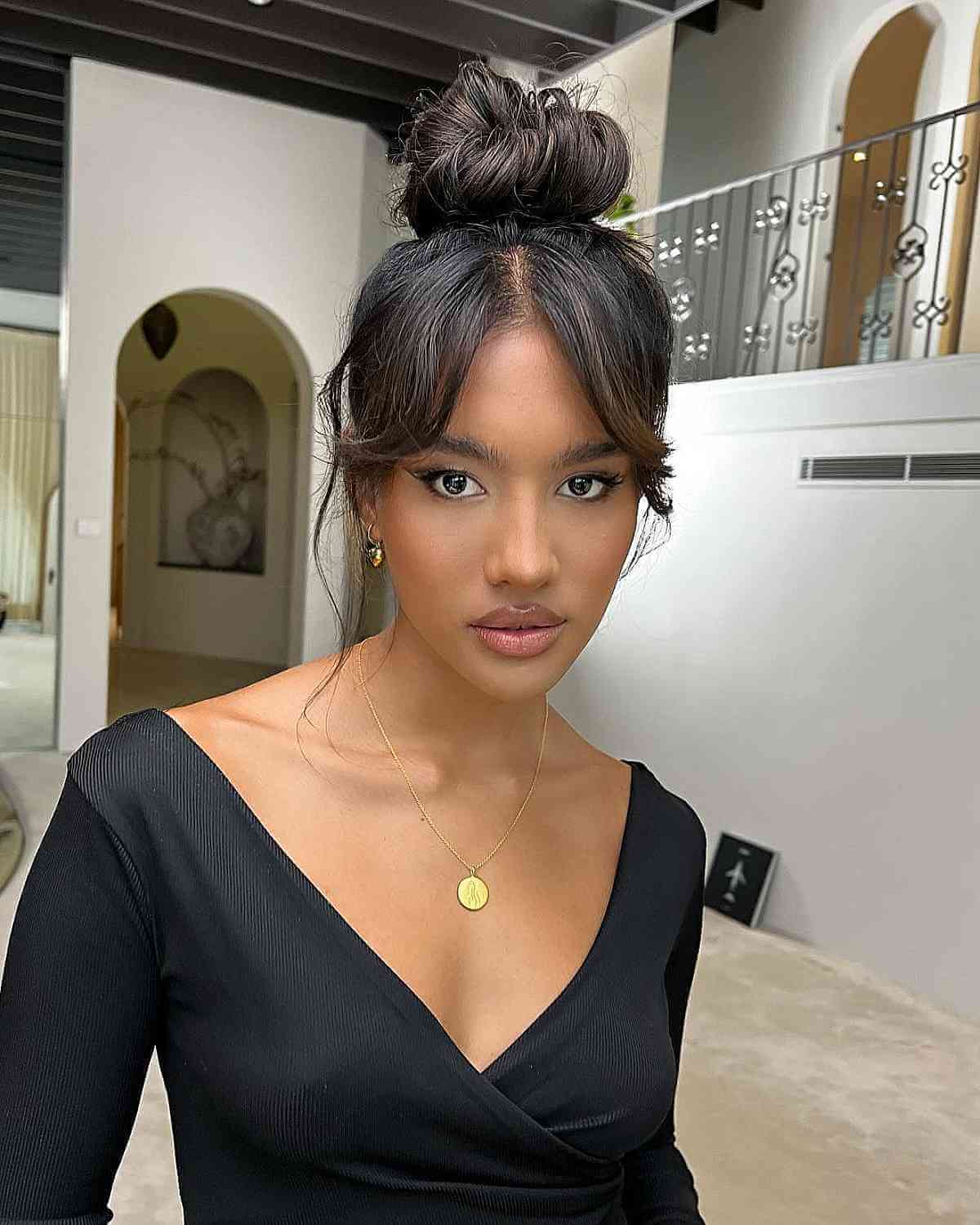 Chic Top Knot with Extended Curtain Bangs