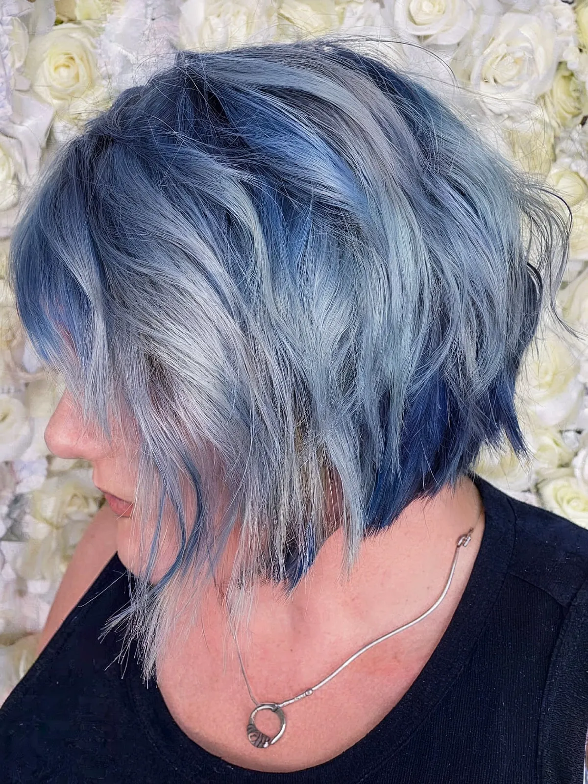 Winter Chic Tousled Bob with Frosty Blue Hues