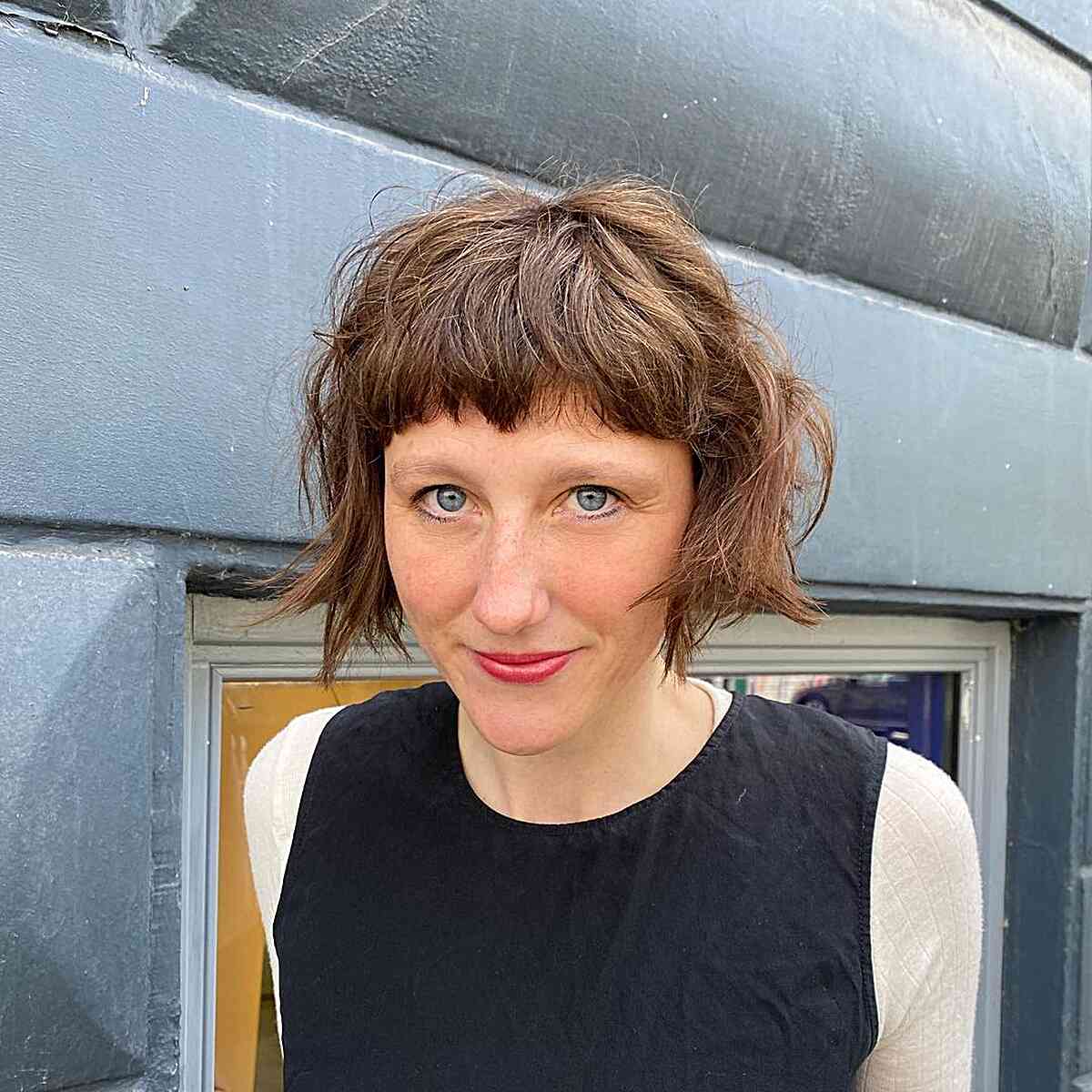 Chic Tousled Bob with Playful Bangs