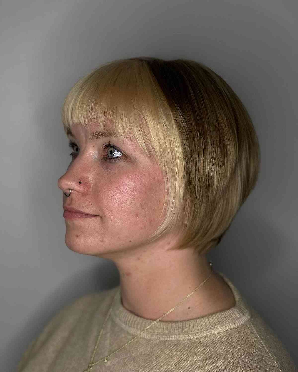 Above the Shoulders Two-Toned Bob with Baby Bangs for Fine Hair