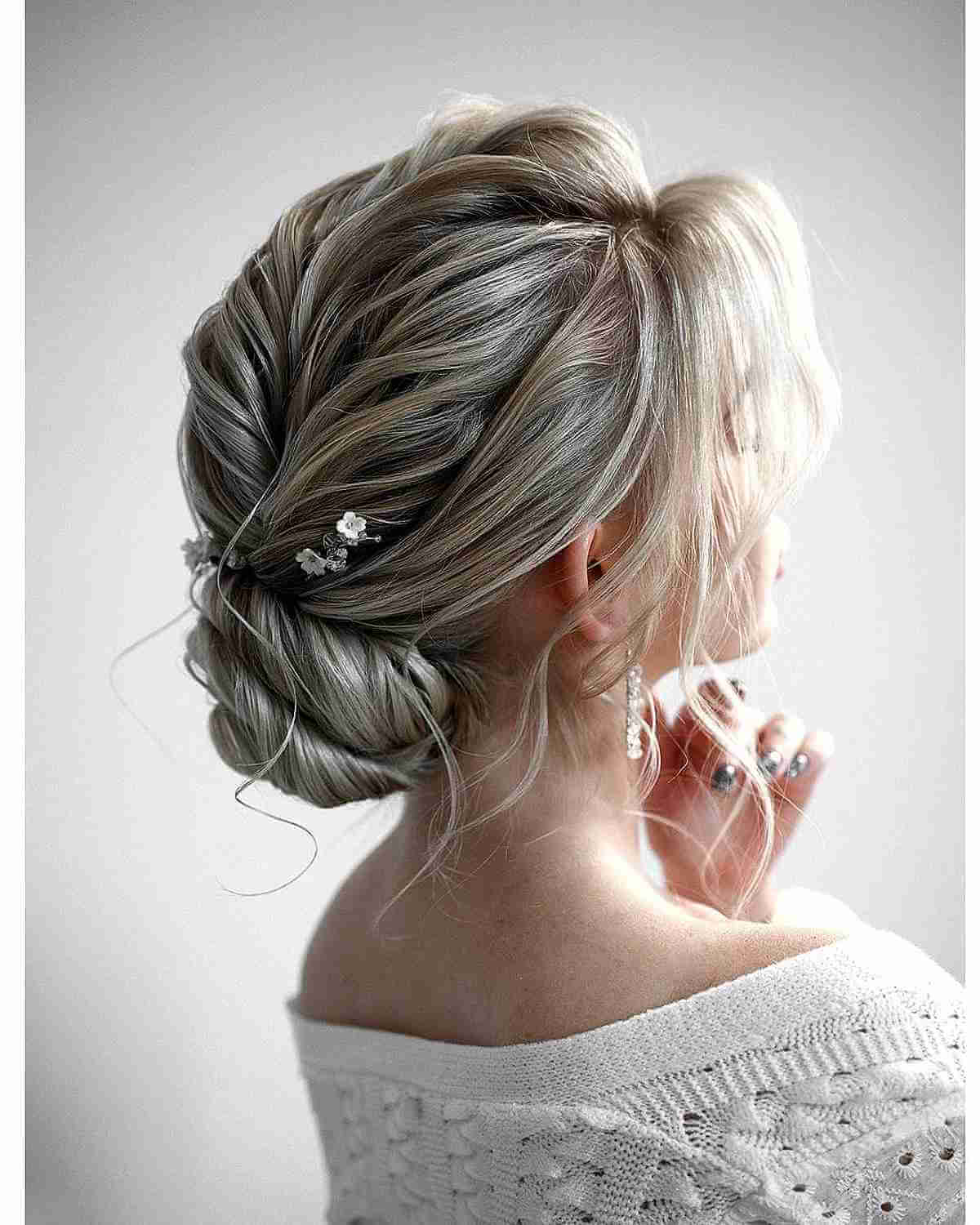 Medium-Length Chic Updo Featuring Bangs