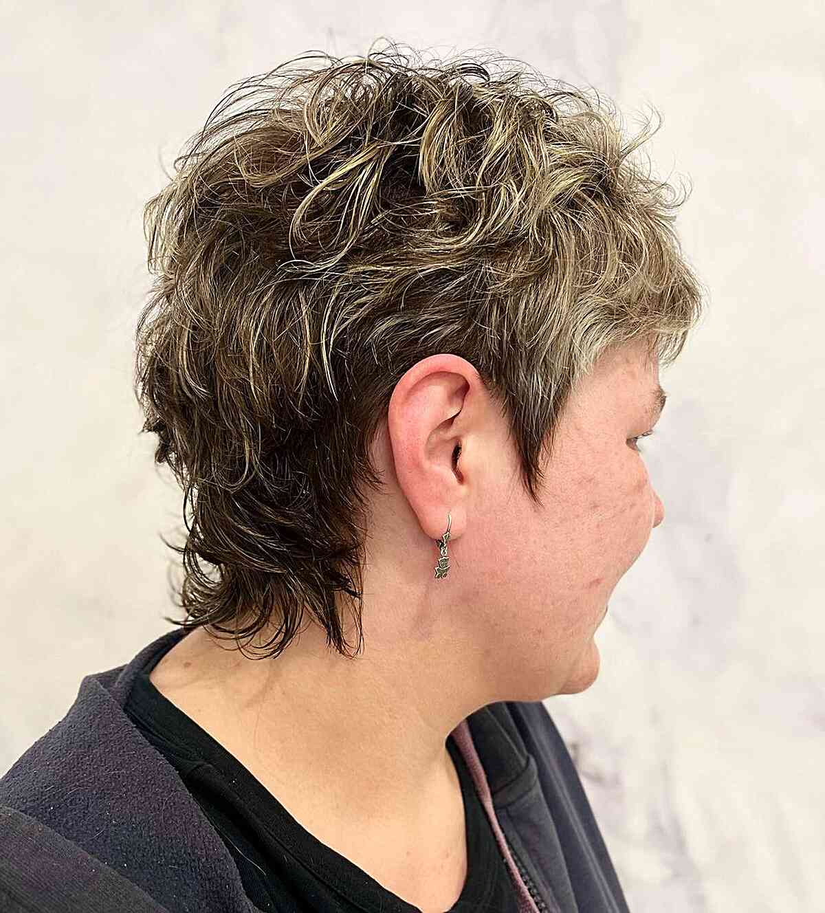 Chic Very Short Tousled Mullet Shag with Golden Highlights for Mature Women