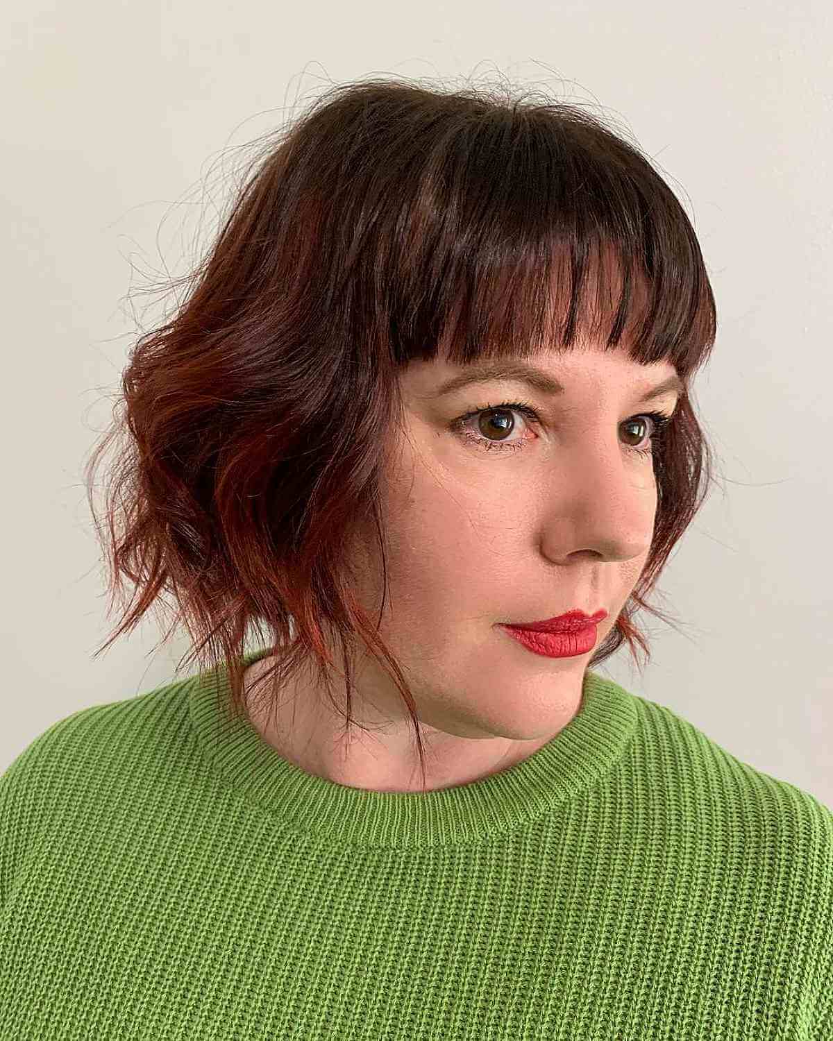 Chic Wavy Bob with Sleek Bangs for 40-year-old women