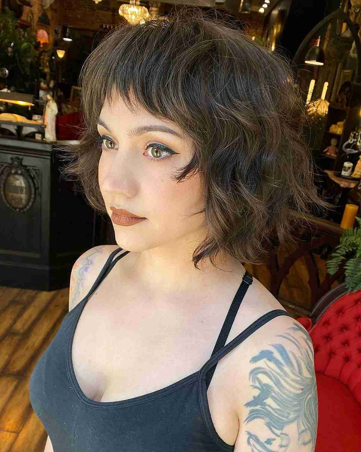 Chic Wavy Bob with Stylish Bangs