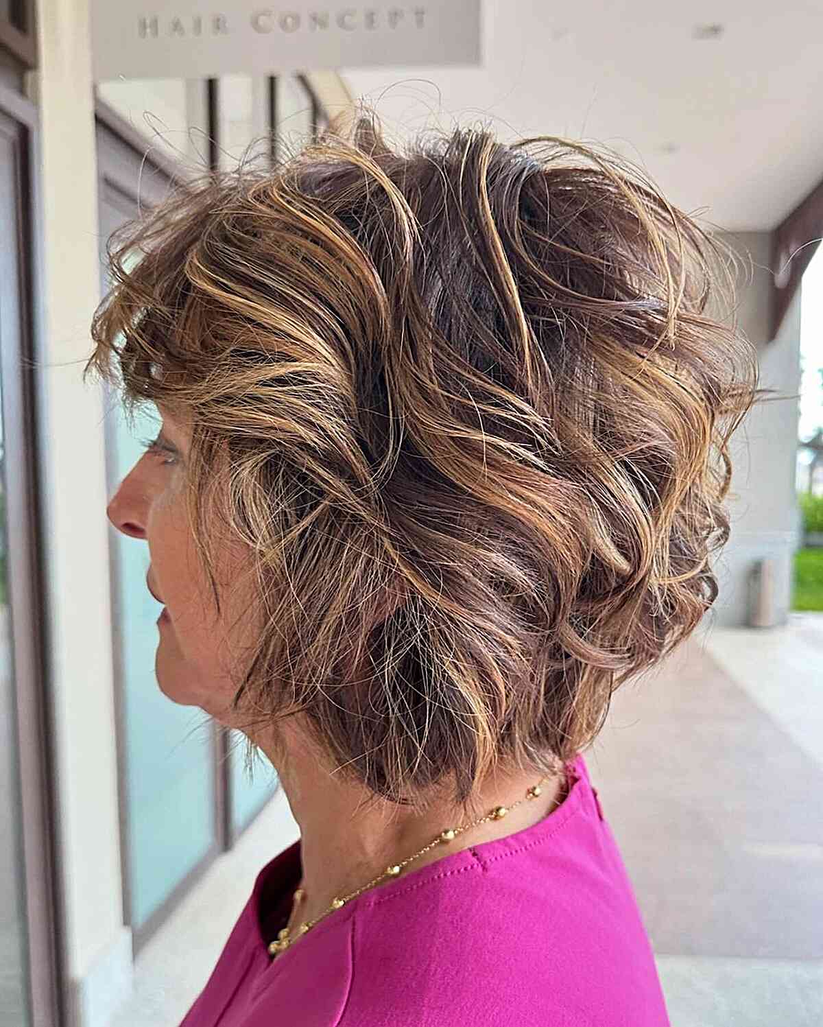Neck-Length Chic Wavy Bob with Volume for an Older Woman