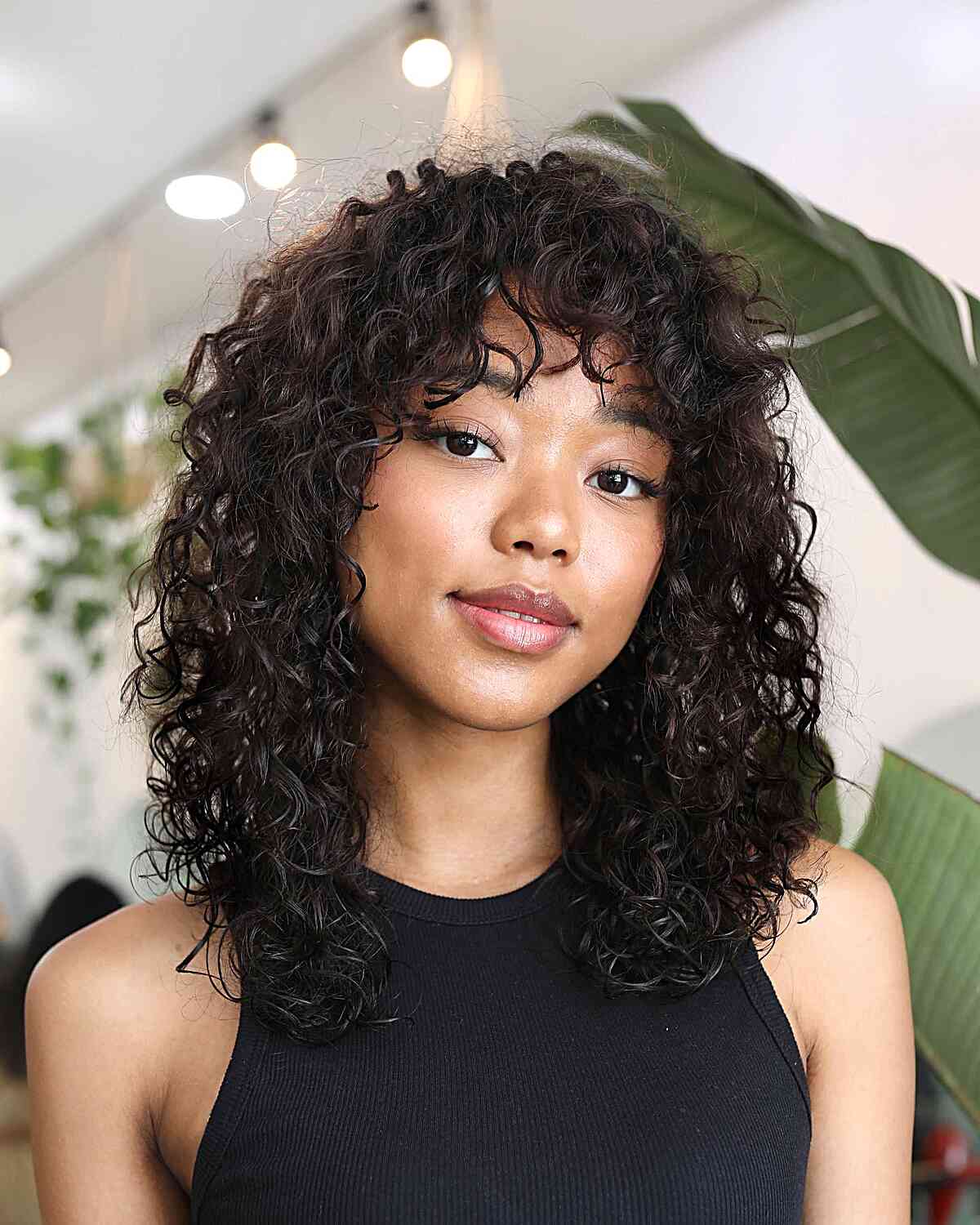 Chic Wet Curly Hair with Bangs