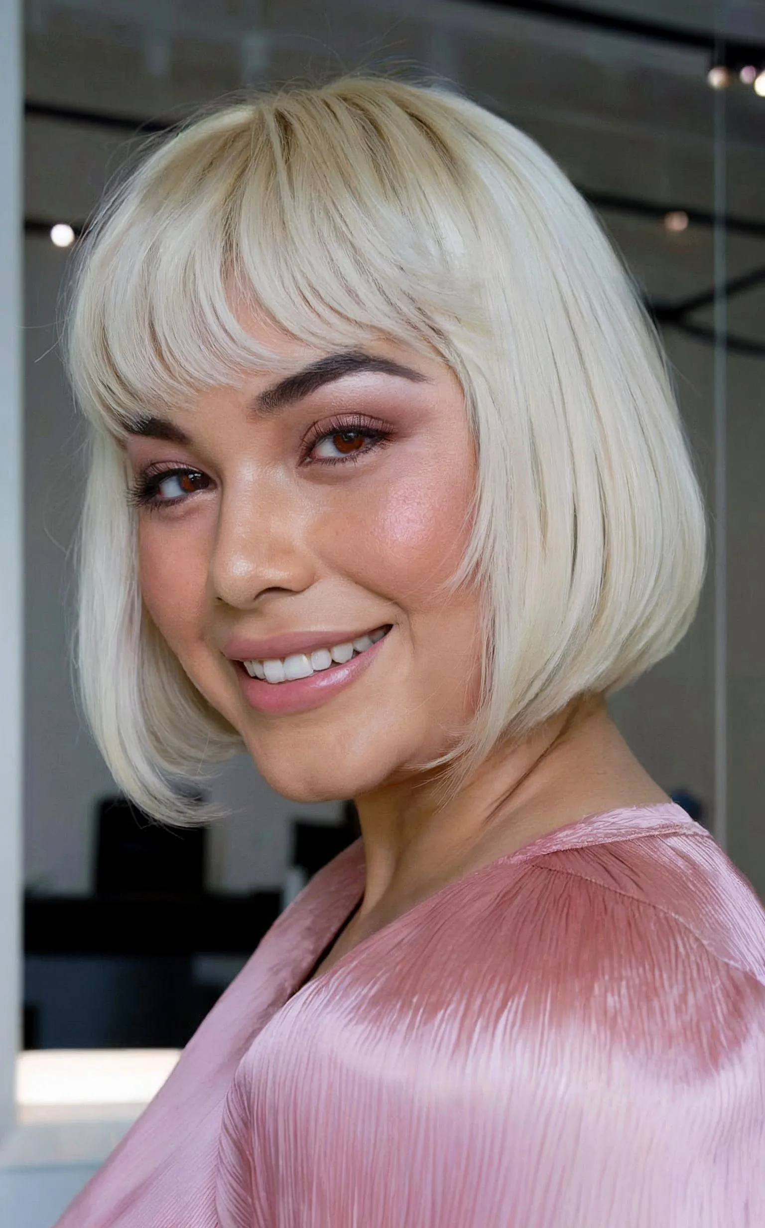 Stylish Short White-Blonde Blunt Bob with Choppy Bangs for Round Face Shapes