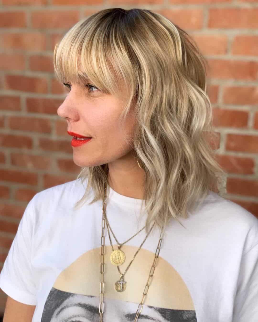 Chilly Blonde Wavy Bob with Bangs