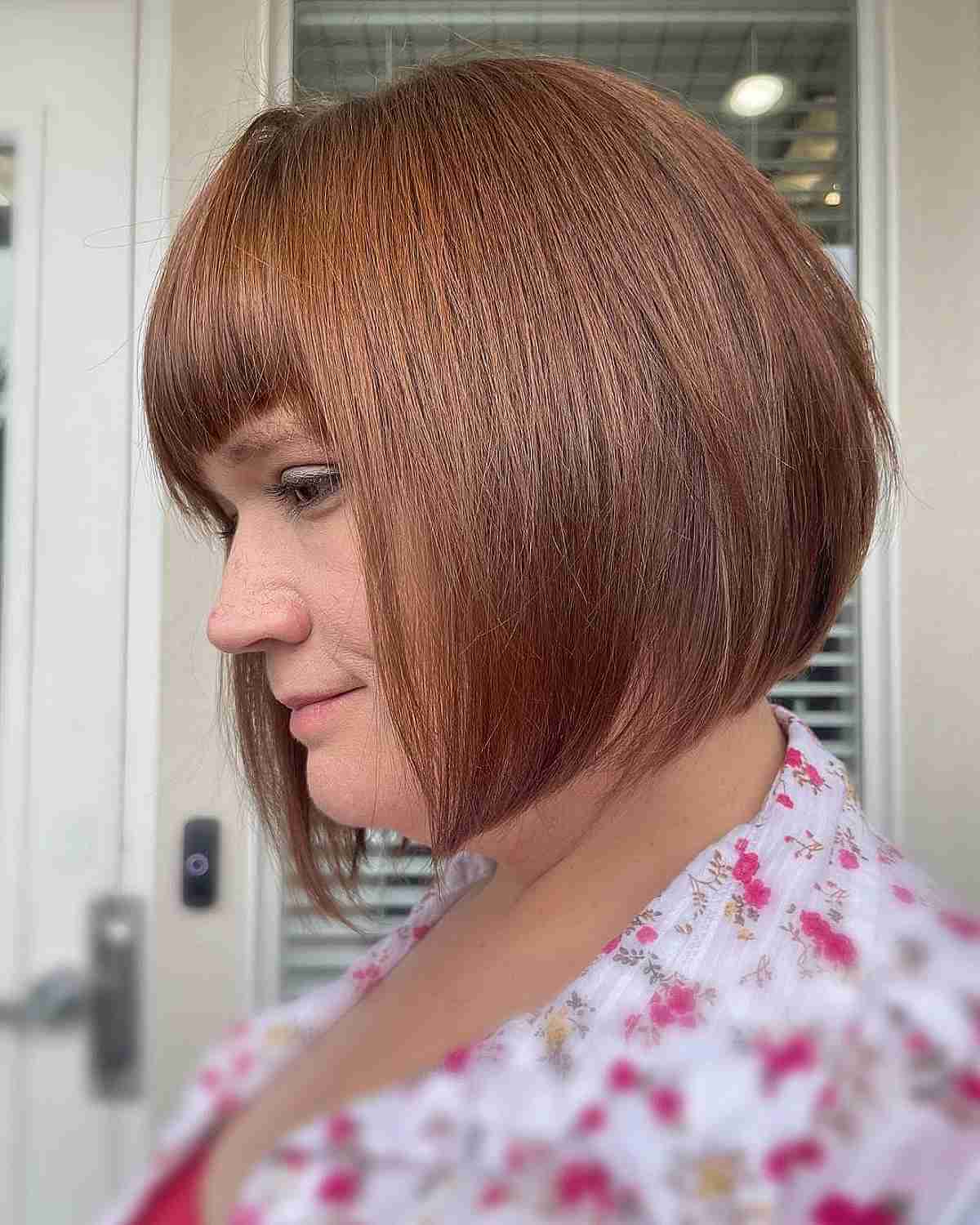 Chin-Length Concave Bob Featuring Full Bangs