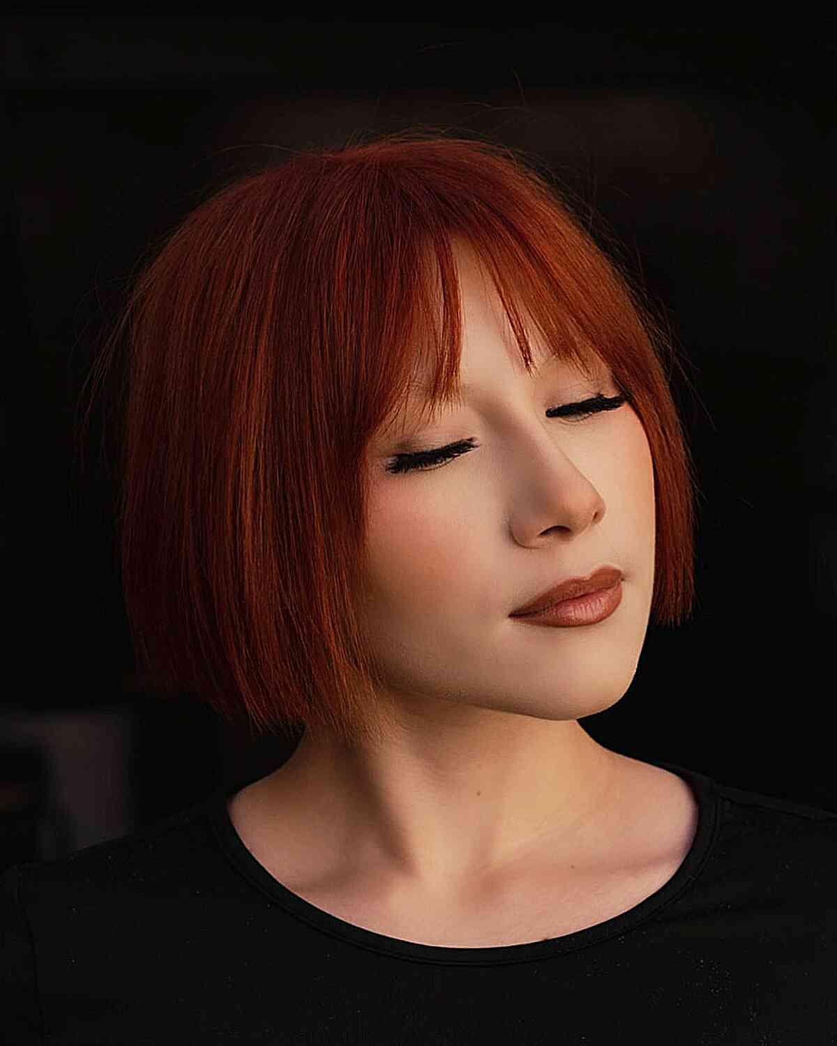 Chin-Length Crimson Bob with Light Bangs for women with fine hair