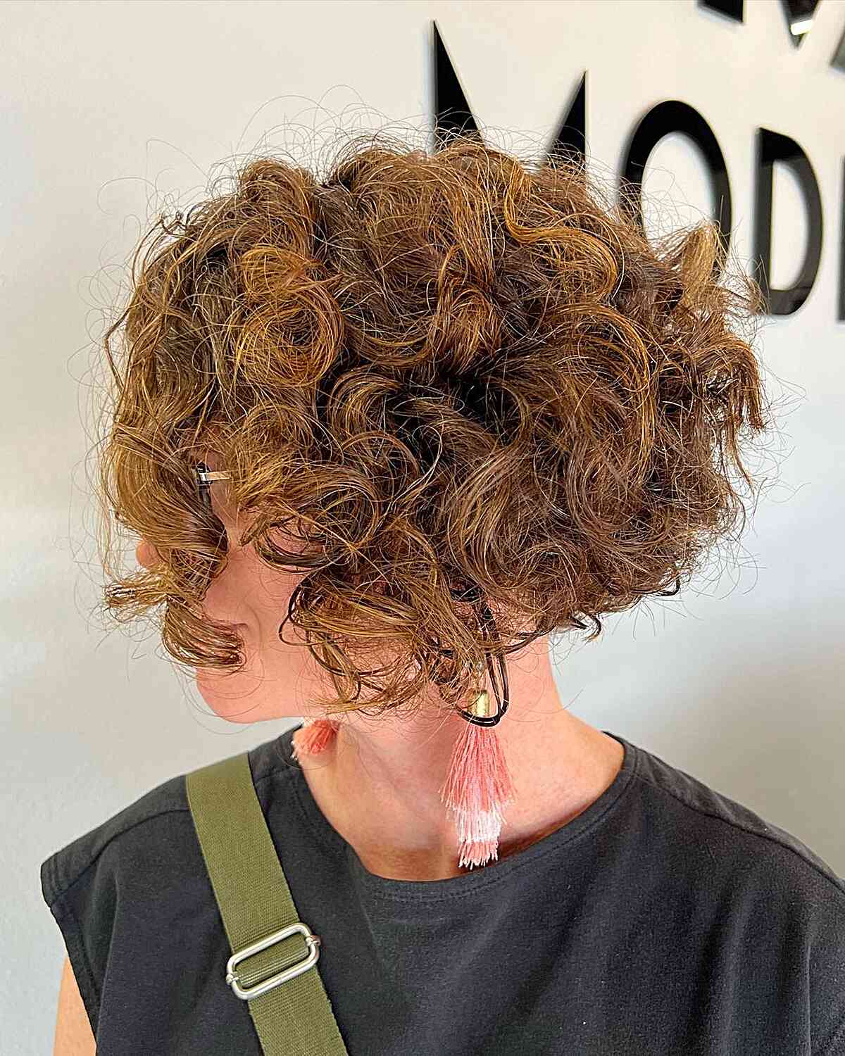 Chin-Length Curly Wedge Hairstyle