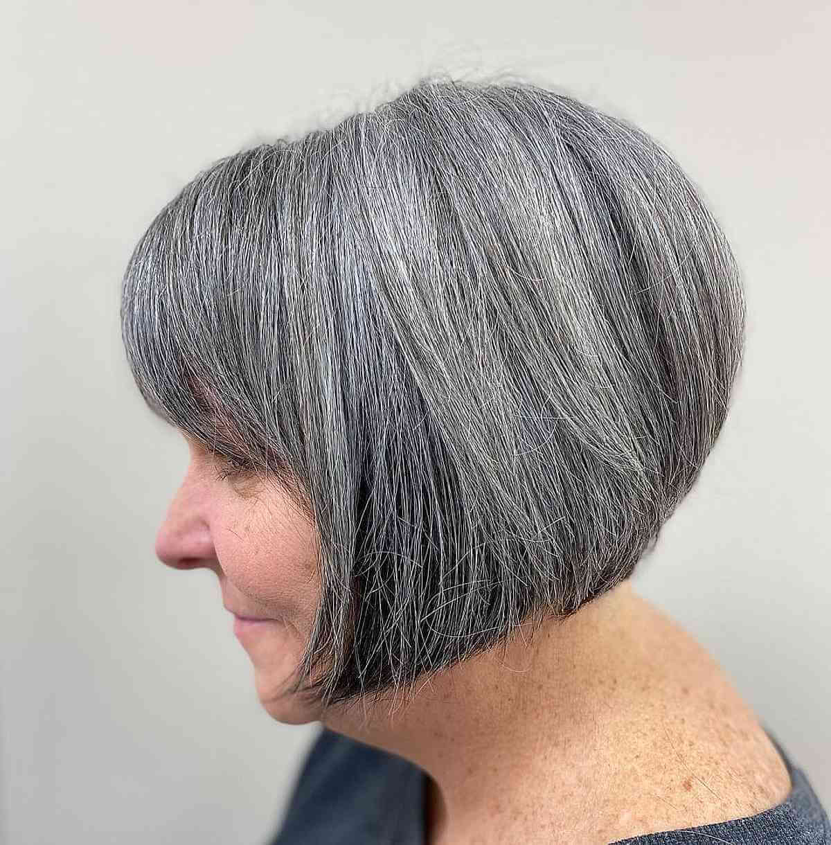 Chin-Length Inverted Bob with Bangs for Women Over Sixty