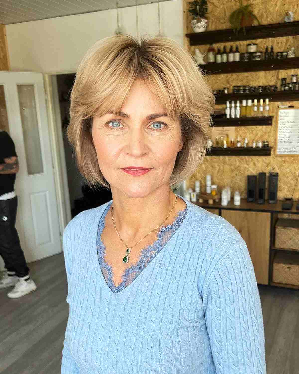Chin-Length Rounded Bob with Curtain Bangs for 40-Year-Olds