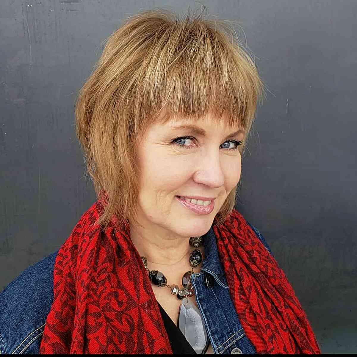 Chin-Length Straight Shag Featuring Full Bangs for women over 50