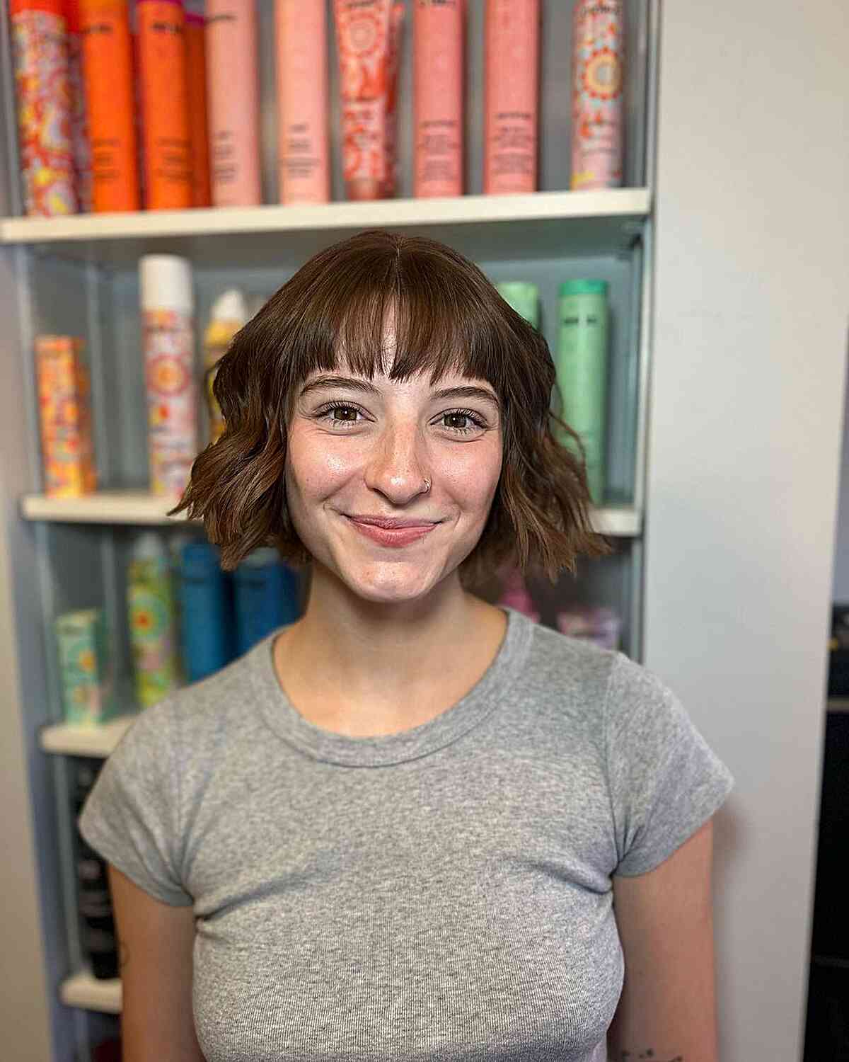 Short Chin-Length Wavy Brown Bob with Bangs