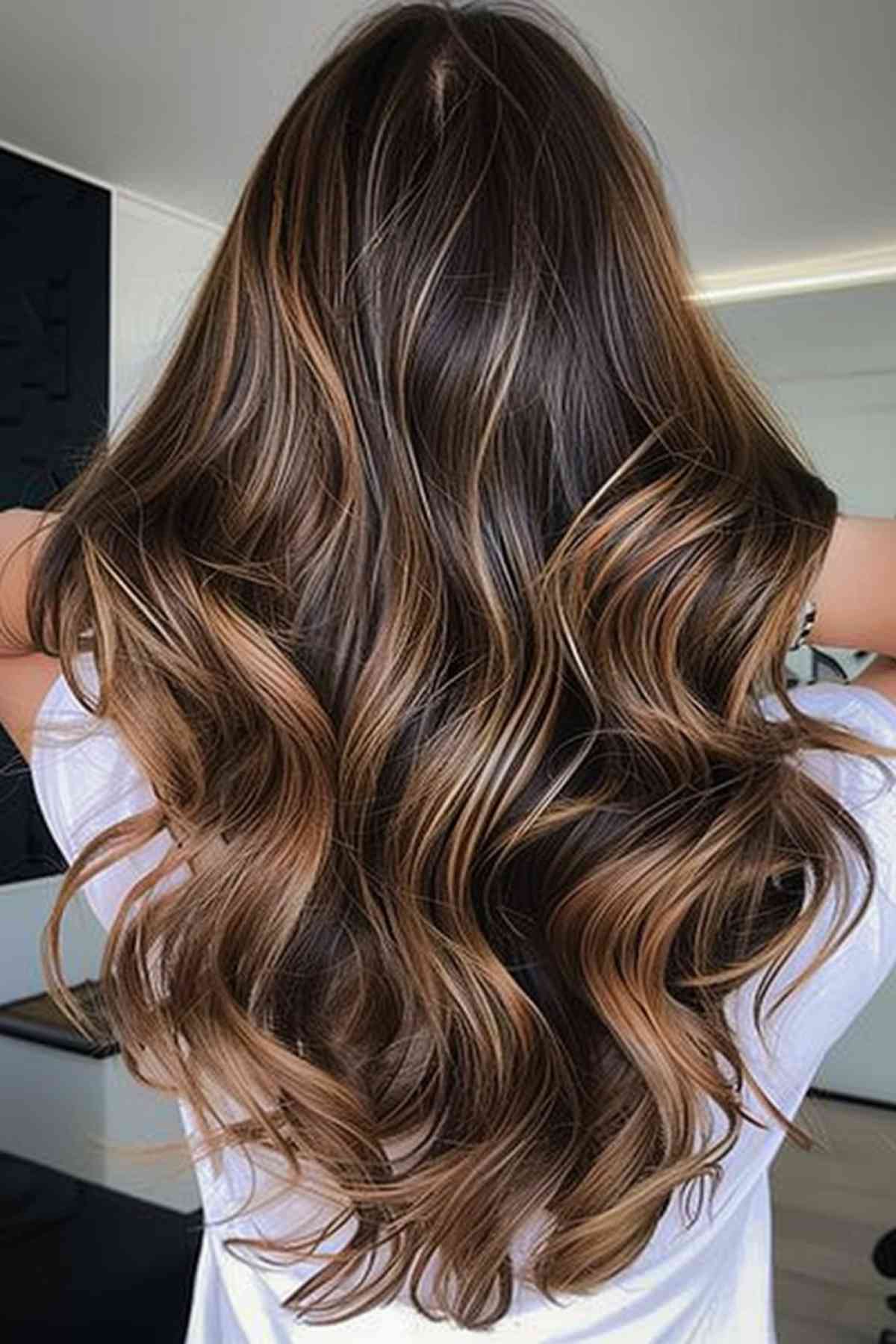 Long Wavy Hair Featuring Chocolate and Caramel Balayage Highlights