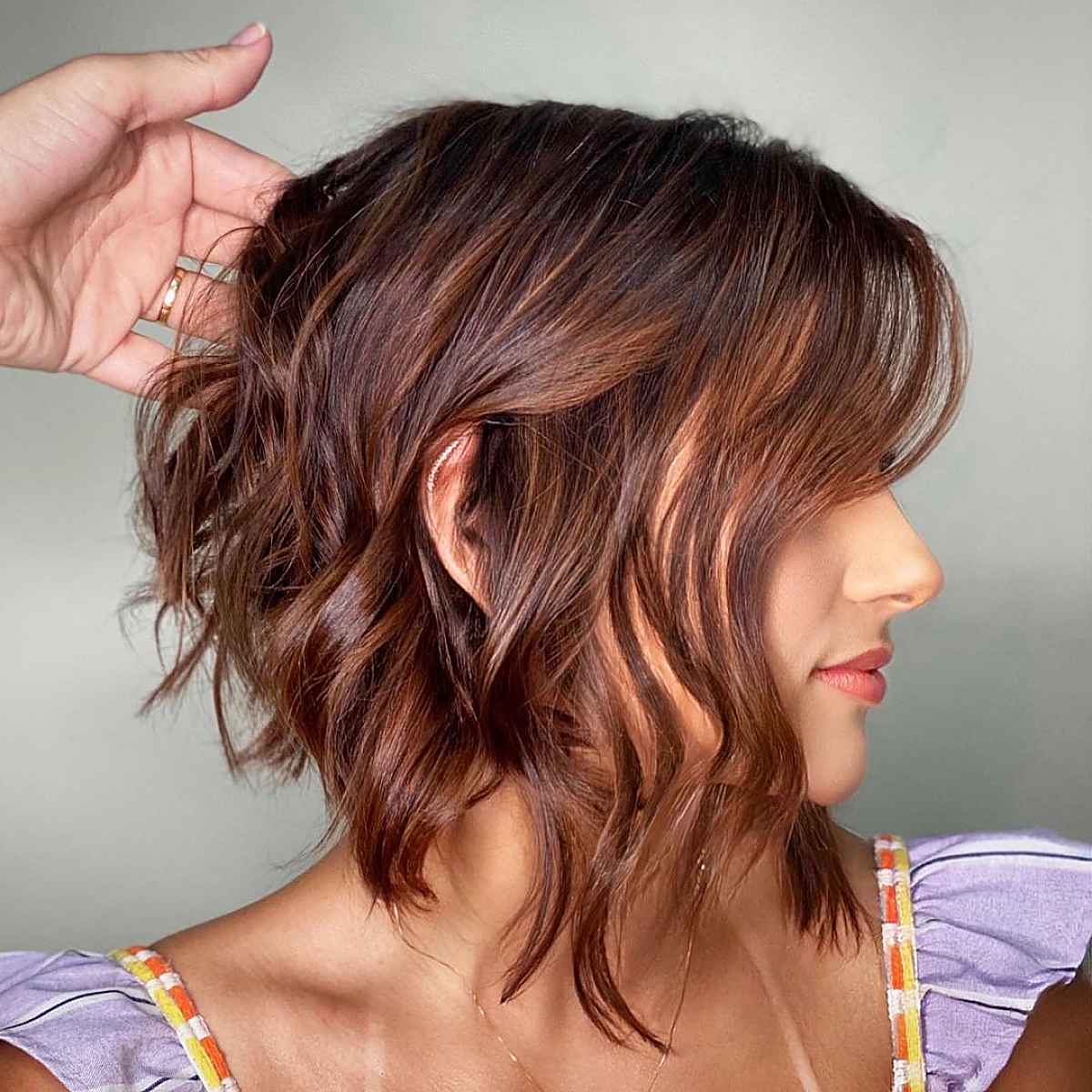 choppy and wavy inverted bob in dark brown