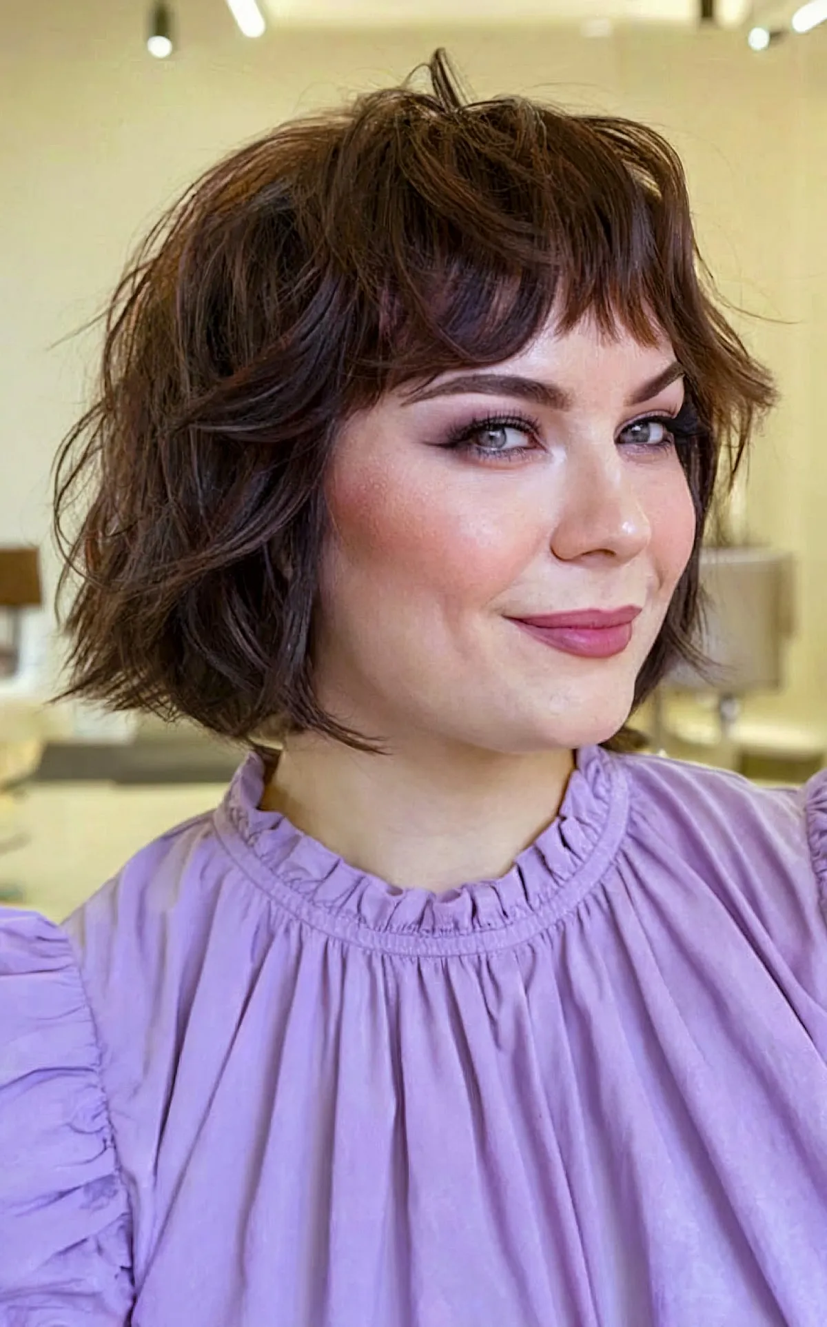Choppy Bangs for Short Textured French Bob Haircut for Round Faces