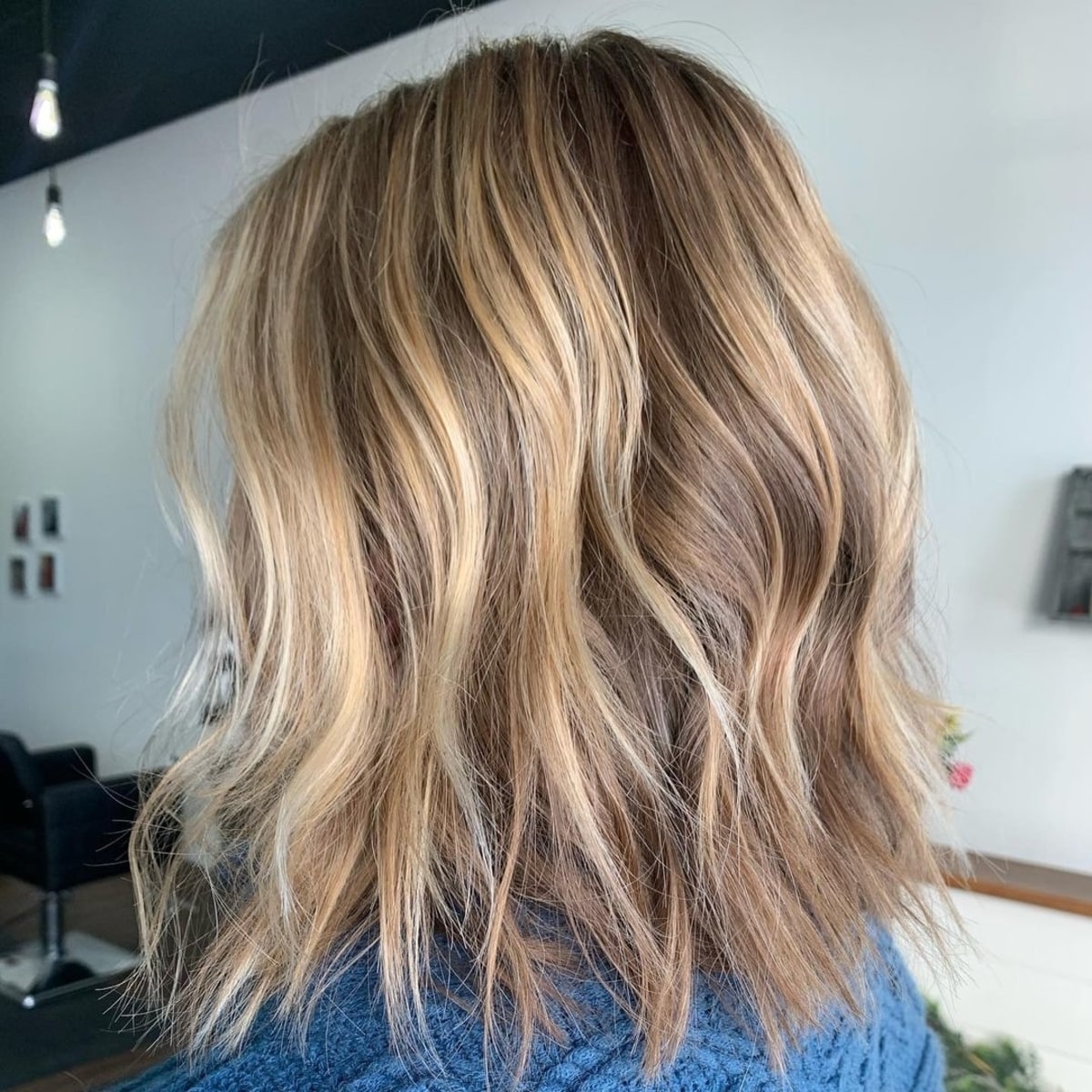 Choppy blonde balayage at shoulder length