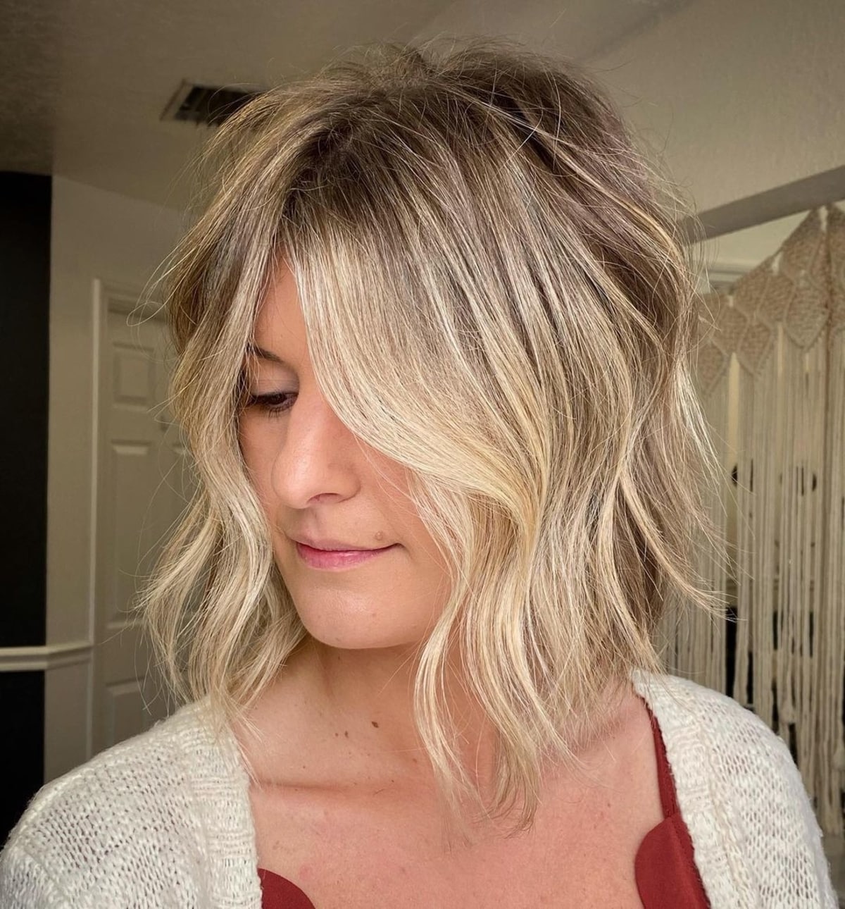 Choppy Blonde Hair Featuring a Center Part