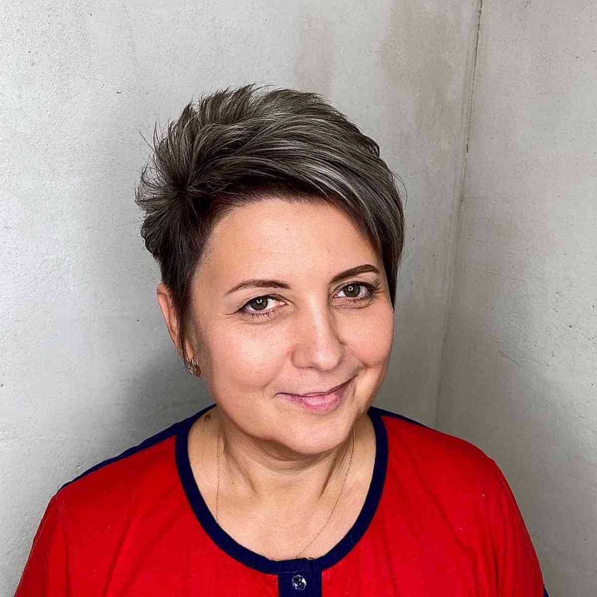Choppy Pixie Hair with Striking Grey Highlights