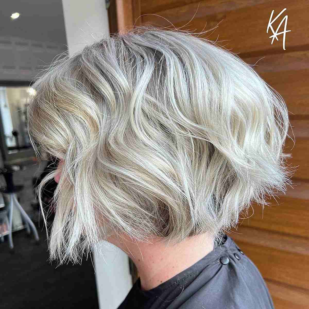 Choppy Chin-Length Wavy Platinum Bob with Defined Ends