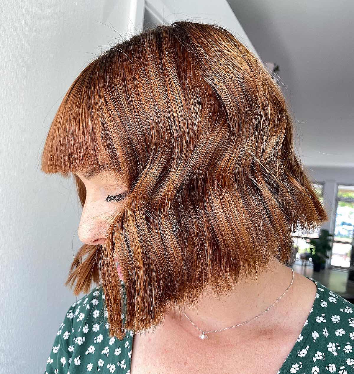 choppy short bob hairstyle with bangs