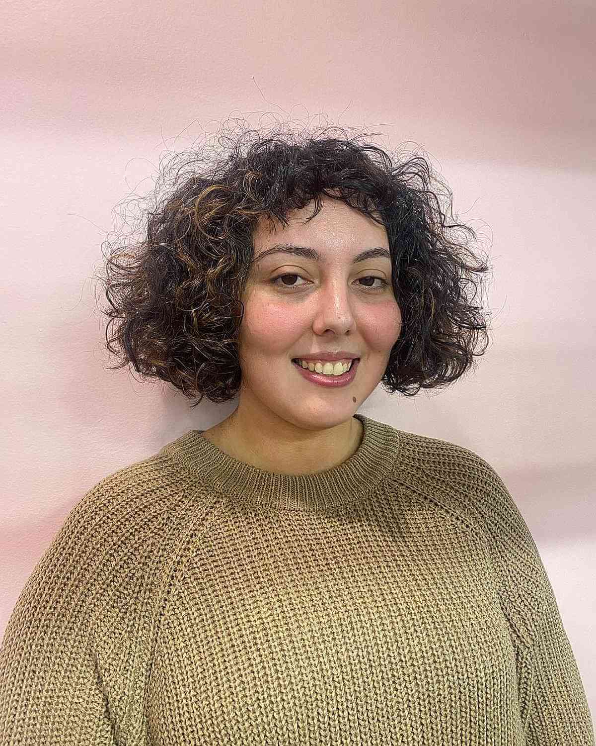 Choppy Chin-Length Hair with Frizzy Curls and Micro Bangs