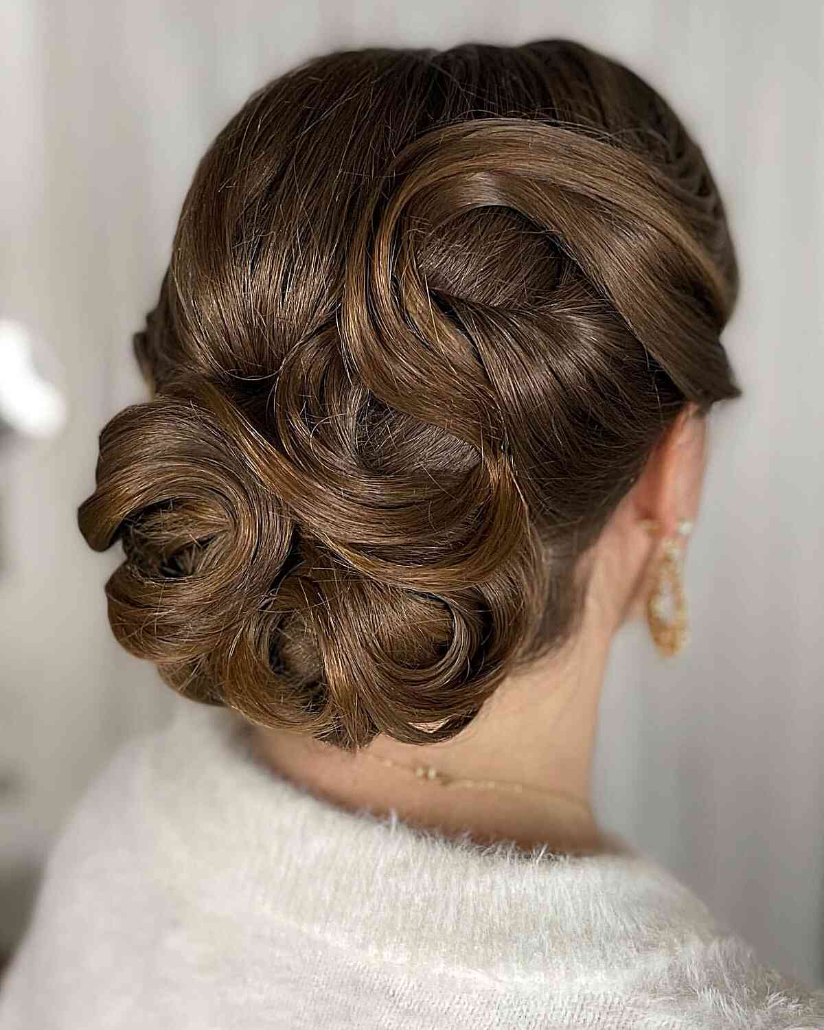 A shoulder length classic vintage updo